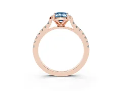 Fancy Blue Emerald Cut Diamond Solitaire Ring Set in Rose gold with Pavé Band and Floral Prong Setting