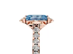 Fancy Blue Emerald Cut Diamond Solitaire Ring Set in Rose gold with Pavé Band and Floral Prong Setting