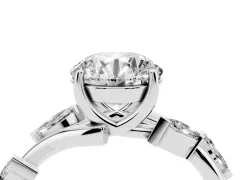 Round Cut Diamond Solitaire Ring Set in Silver with Twisted Marquise Accent Band