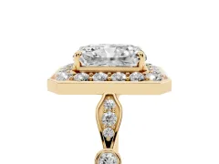 Radiant Cut Diamond Halo Engagement Ring Set in Yellow gold with Twisted Band and Prong Setting