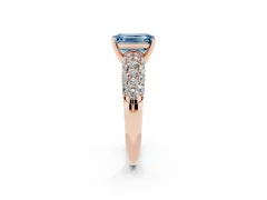 Fancy Blue Emerald Cut Diamond Pavé Band Solitaire Ring Set in Rose gold with Close-Set Accent Stones and Prong Setting