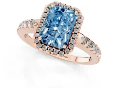 Fancy Blue Radiant Cut Diamond Halo Ring Set in Rose gold with Pavé Shoulders and Halo-Framed Center
