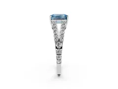 Fancy Blue Emerald Cut Diamond Split Shank Pavé Engagement Ring Set in White gold with Prong-Held Center Stone