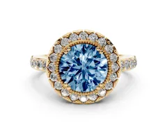 Fancy Blue Round Cut Diamond Halo Ring Set in Yellow gold with Pavé Shank and Prong Setting