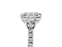 Emerald Cut Diamond Three-Stone Ring Set in White gold with Pavé Band and Graduated Sides