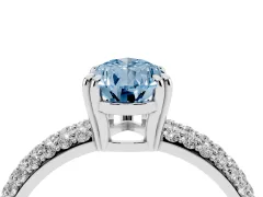 Fancy Blue Pear Cut Diamond Solitaire Ring Set in Platinum with Multi-Row Round Pavé Band and Prong Setting