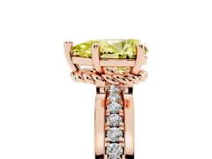 Fancy Yellow Pear Cut Diamond Solitaire Ring Set in Rose gold with Channel Set Band and Prong Setting