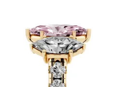 Fancy Pink Marquise Cut Diamond Three-Stone Ring Set in Yellow gold with Pavé Band