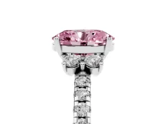 Fancy Pink Oval Cut Diamond Three-Stone Pavé Ring Set in Platinum with Prong Setting