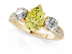 Fancy Yellow Pear Cut Diamond Three-Stone Ring Set in Yellow gold with Round Side Stones and Pavé Band