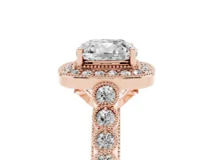 Cushion Cut Diamond Milgrain Halo Solitaire Ring Set in Rose gold with Bezel Set Side Stones and Pavé Band