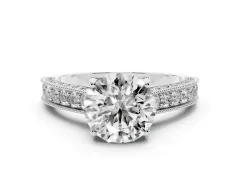 Round Cut Diamond Solitaire Ring Set in White gold with Milgrain-Edged Pavé Band and Prong Setting