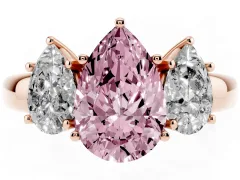 Fancy Pink Pear Cut Diamond Three-Stone Ring Set in Rose gold with Bold Center and Classic Band