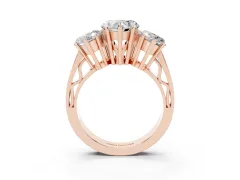 Heart Cut Diamond Three-Stone Ring Set in Rose gold with Textured Band