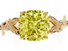 Fancy Yellow Cushion Cut Diamond Solitaire Ring Set in Yellow gold with Leaf Motif Band