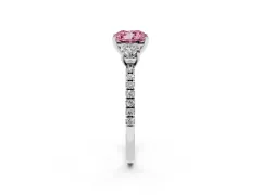 Fancy Pink Cushion Cut Diamond Three-Stone Ring Set in White gold with Pavé Band and Graduated Sides