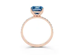 Fancy Blue Asscher Cut Diamond Solitaire Engagement Ring Set in Rose gold with Round Pavé Band and Prong Setting