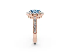 Fancy Blue Oval Cut Diamond Halo Pavé Engagement Ring Set in Rose gold with Milgrain Detailing
