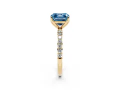 Fancy Blue Asscher Cut Diamond Solitaire Engagement Ring Set in Yellow gold with Round Pavé Band and Prong Setting