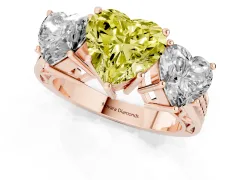 Fancy Yellow Heart Cut Diamond Three-Stone Ring Set in Rose gold with Textured Band