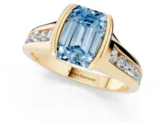 Fancy Blue Emerald Cut Diamond Bezel-Set Solitaire Ring Set in Yellow gold with Channel-Set Band