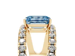 Fancy Blue Emerald Cut Diamond Split Shank Pavé Solitaire Ring Set in Yellow gold with Open Shank Design