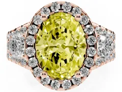 Fancy Yellow Oval Cut Diamond Halo Split Shank Ring Set in Rose gold with Round Accent Stones and Prong Setting