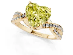 Fancy Yellow Heart Cut Diamond Twist Pavé Solitaire Engagement Ring Set in Yellow gold with Prong Setting