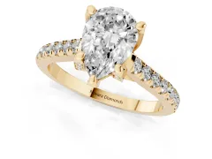 Pear Cut Diamond Solitaire Ring Set in Yellow gold with Brilliant Pavé Band and Prong Setting