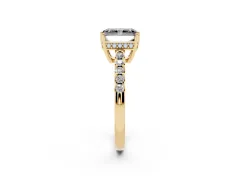Fancy Black Radiant Cut Diamond Solitaire Engagement Ring Set in Yellow gold with Pavé Band and Prong Setting