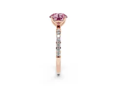Fancy Pink Round Cut Diamond Solitaire Engagement Ring Set in Rose gold with Round Pavé Band and Prong Setting