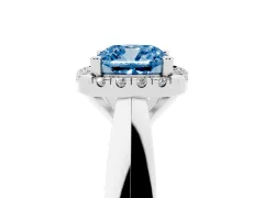 Fancy Blue Cushion Cut Diamond Halo Solitaire Engagement Ring Set in White gold with Square Band and Prong Setting