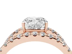 Cushion Cut Diamond Split Shank Pavé Solitaire Ring Set in Rose gold with Open Shank Design