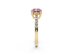 Fancy Pink Cushion Cut Diamond Solitaire Engagement Ring Set in Yellow gold with Pavé Band and Prong Setting