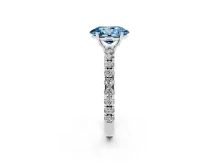 Fancy Blue Oval Cut Diamond Pavé Solitaire Engagement Ring Set in Platinum with Prong Setting