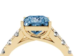 Fancy Blue Princess Cut Diamond Solitaire Ring Set in Yellow gold with Cut-Down Micro Pavé Band and Prong Setting