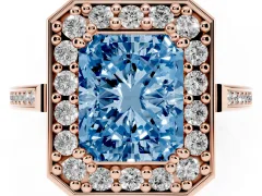 Fancy Blue Radiant Cut Diamond Halo Ring Set in Rose gold with Accent-Lined Split Shank and Prong Setting
