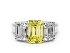 Fancy Yellow Emerald Cut Diamond Three-Stone Ring Set in Platinum with Plain Polished Band
