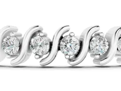 Round Brilliant Diamond Channel Tennis Bracelet Set in White gold with S-Shaped Prongs