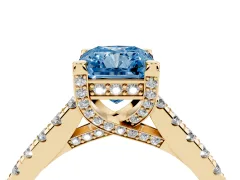Fancy Blue Radiant Cut Diamond Solitaire Ring Set in Yellow gold with Brilliant Pavé Band and Prong Setting