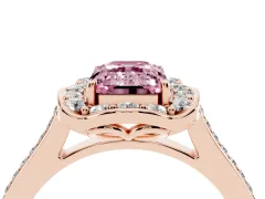 Fancy Pink Emerald Cut Diamond Halo Ring Set in Rose gold with Pavé-Lined Shoulders and Prong Setting