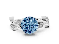 Fancy Blue Round Cut Diamond Solitaire Ring Set in Silver with Twisted Marquise Accent Band