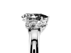 Fancy Black Pear Cut Diamond Three-Stone Ring Set in White gold with Bold Center and Classic Band