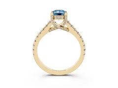 Fancy Blue Emerald Cut Diamond Solitaire Ring Set in Yellow gold with Brilliant Pavé Band and Prong Setting
