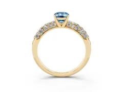 Fancy Blue Emerald Cut Diamond Pavé Band Solitaire Ring Set in Yellow gold with Close-Set Accent Stones and Prong Setting