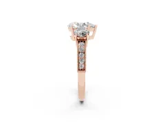 Pear Cut Diamond Three-Stone Ring Set in Rose gold with Round Side Stones and Pavé Band