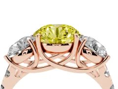Fancy Yellow Round Cut Diamond Three-Stone Ring Set in Rose gold with Pavé Band