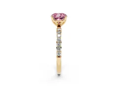 Fancy Pink Cushion Cut Diamond Solitaire Engagement Ring Set in Yellow gold with Round Pavé Band and Prong Setting