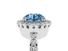Fancy Blue Round Cut Diamond Halo Ring Set in Platinum with Pavé Shank and Prong Setting