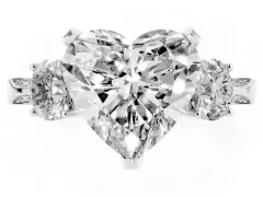 Heart Cut Diamond Three-Stone Ring Set in Platinum with Pavé Band and Smaller Side Stones